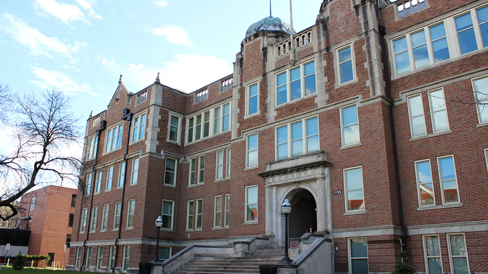 Jennings Hall, a red brick building in Winter