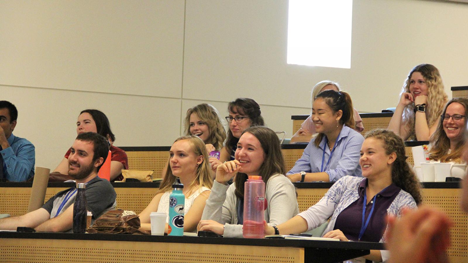 Photo of REU students listening to a talk